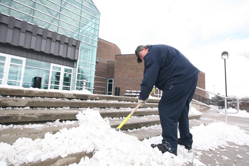 GVL / Eric Coulter
Marc Westrate of Facilities Services shovels Kirkhof Sunday 