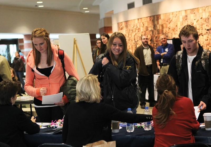 GVL / Robert Mathews 
Students visiting booths for the Non-Profit Volunteer and Internship Fair that took place in Henry Hall.