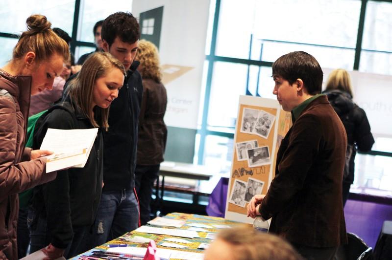 GVL / Robert Mathews 
Students visiting booths for the Non-Profit Volunteer and Internship Fair that took place in Henry Hall.