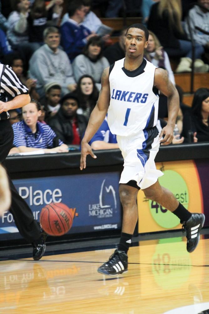 GVL / Robert Mathews
Guard Breland Hogan (1) drives the ball upcourt. The Lakers were defeated 60-50 against Hillsdale.