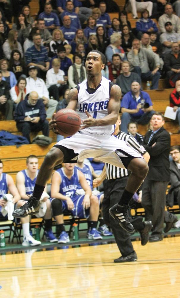 GVL / Robert Mathews
Breland Hogan (1) jumps to the hoop after a fast break point. Hogan lead the team with 3 steals. 