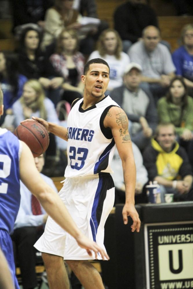 GVL / Robert Mathews
Senior James Thomas looks to set up a play during Saturdays game against Hillsdale. The Lakers were defeated 60-50.