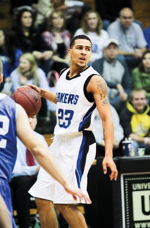 GVL / Robert Mathews
Senior James Thomas (23) looking to pass the ball during a past matchup against Hillsdale College. 