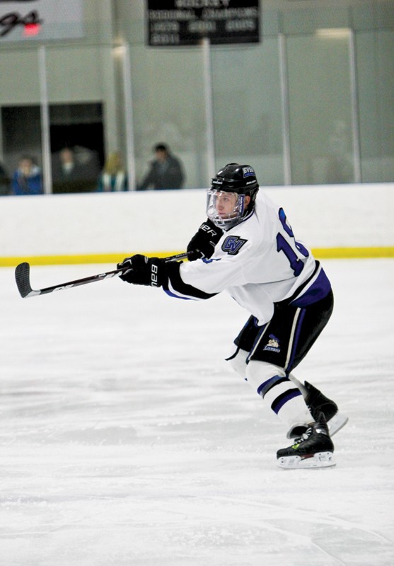 GVL / Robert Mathews
Junior Tim Marney (18) takes a shot at the net during the Lakers latest matchup against D1 Oakland University. 