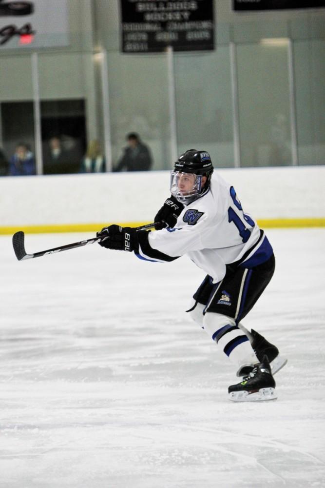 GVL / Robert Mathews
Junior Tim Marney (18) takes a shot at the net during the Lakers latest matchup against D1 Oakland University. 