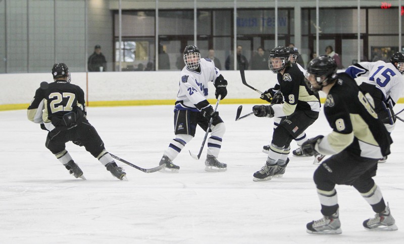 GVL / Robert Mathews
Defenseman Dylan Dault (4) prepares for Oakland to move up the ice. 