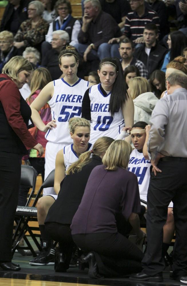 GVL / Robert Mathews
Head coach Janel Burgess discusses a play with the team during a timeout. 