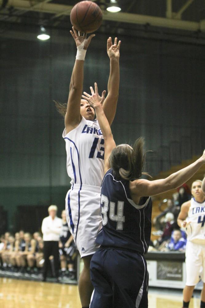 GVL / Robert Mathews
Junior Brittany Taylor (13) shoots a jump shot against an opposing Hillsdale player. Taylor lead the team in rebounds with a total of 10.