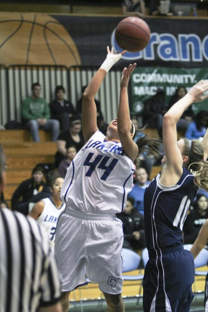 GVL / Robert Mathews
Guard Dani Crandall (44) jumps for a rebound during Saturdays game against Hillsdale. Crandall had 6 rebounds on the night. 