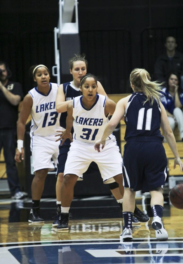 GVL / Robert Mathews
Junior Briauna Taylor (31) guards against an opposing Hillsdale player. She lead the Lakers with 18 points. 