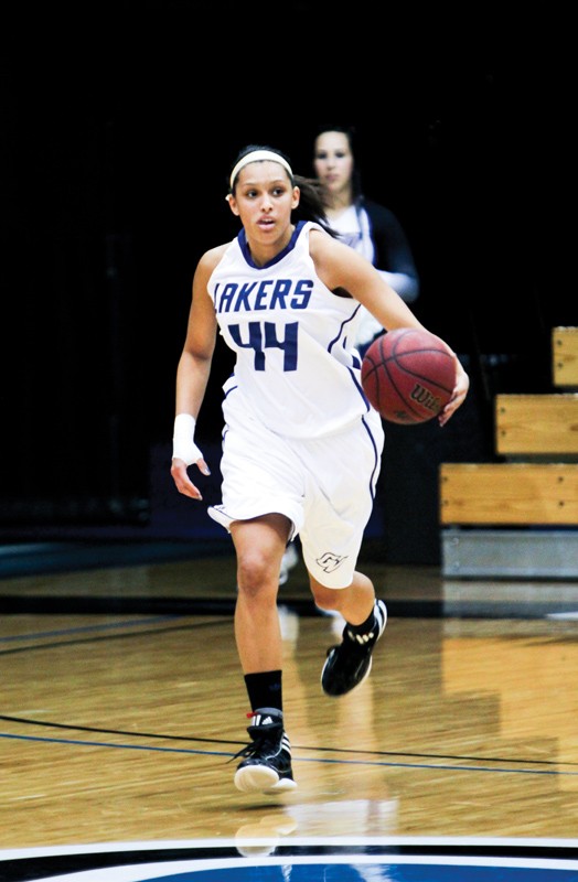 GVL / Robert Mathews
Junior guard Briauna Taylor looking to pass the ball at the top of the key during a previous match against Hillsdale College