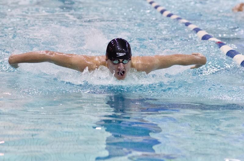 GVL / Bo Anderson
GVSU club swimmer Ethan Christensen surges through the 100 yard butterfly against CMU on Saturday