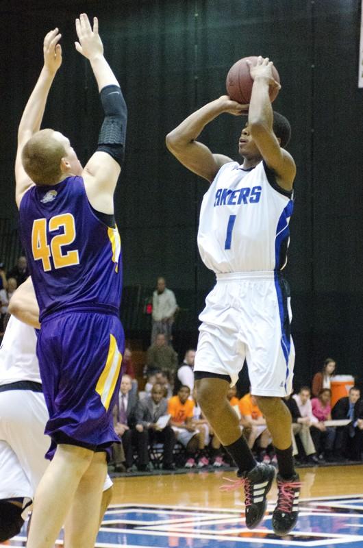 GVL / Bo Anderson

GVSU's Breland Hogan fires a jumper over Ashland's Ben Mixer on Thursday night.