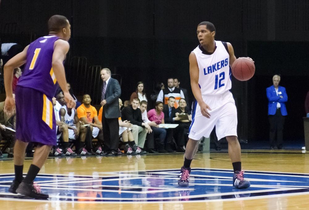 GVL / Bo Anderson

Rob Woodson brings the ball up court during Thursday's win over Ashland.