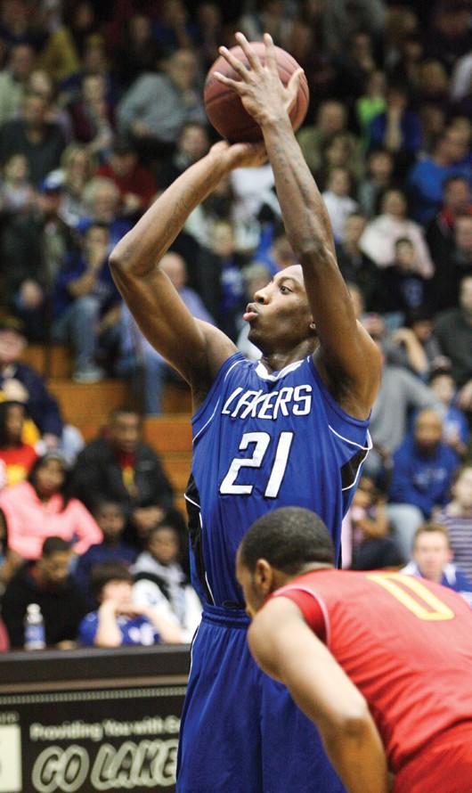 GVL / Eric Coulter
Junior Tyrone Lee (21) shooting a free throw against Ferris State.