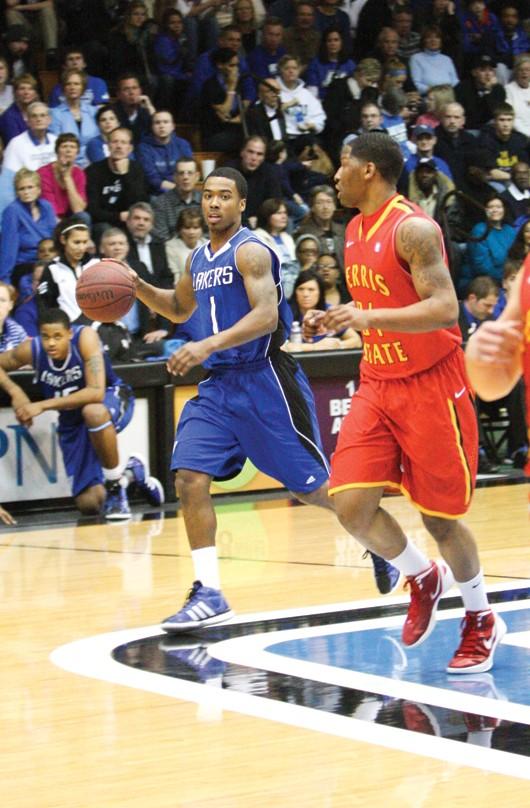 GVL / Eric Coulter
Junior guard Breland Hogan (1) taking the ball upcourt against Farris State