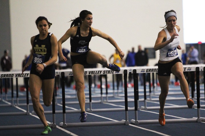 GVL / Robert Mathews 
Freshman Victoria Schiller hurdling at 2012 GVSU Big Meet on Saturday (Feb. 11).