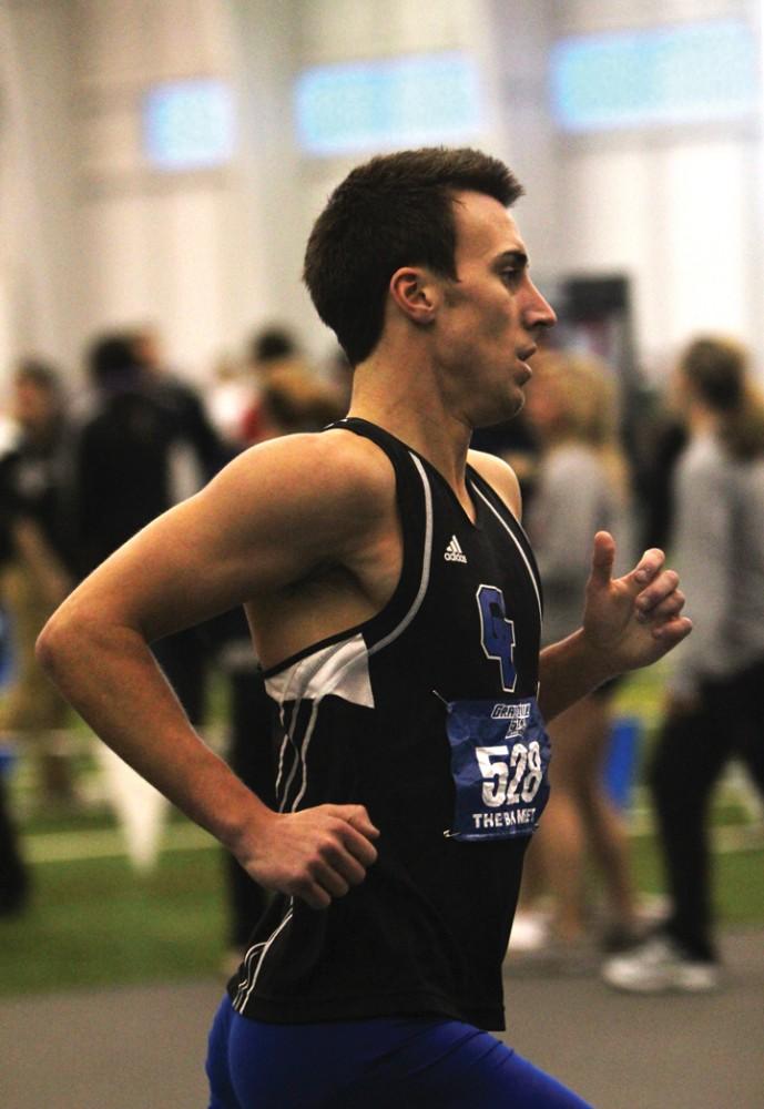 GVL / Robert Mathews 
Sophomore distance runner Lucas Roscoe at the 2012 GVSU Big Meet on Saturday (Feb. 11).