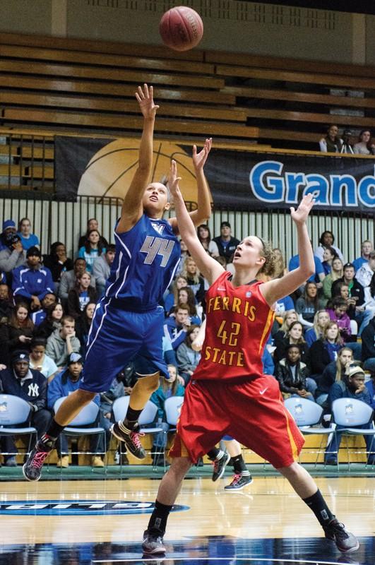 GVL / Bo Anderson

GVSU's Dani Crandall shoots a layup over Tricia Principe from Ferris