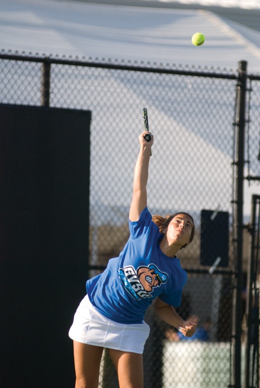 GVL / Archive
Senior tennis player Alyss Lucas serving the ball during a past match.
