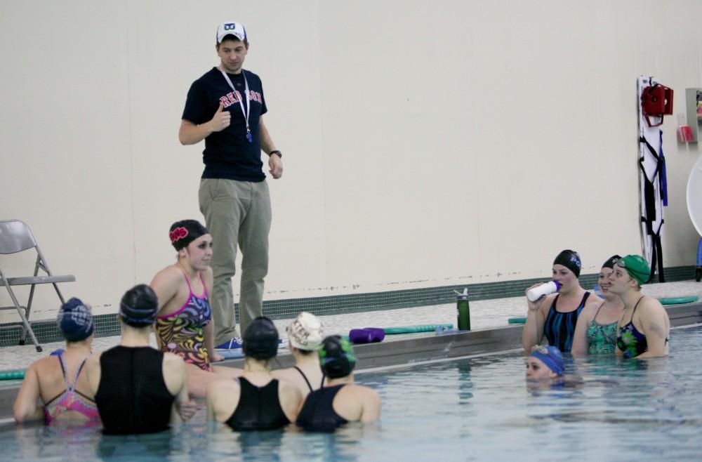 GVL / Eric Coulter
Coach Josh Ahrendt instructs the athletes in the pool during practice