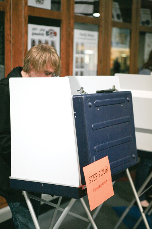 GVL / Eric Coulter
GVSU senior and computer science major Nathan Hanson voting for his GOP candidate of choice.