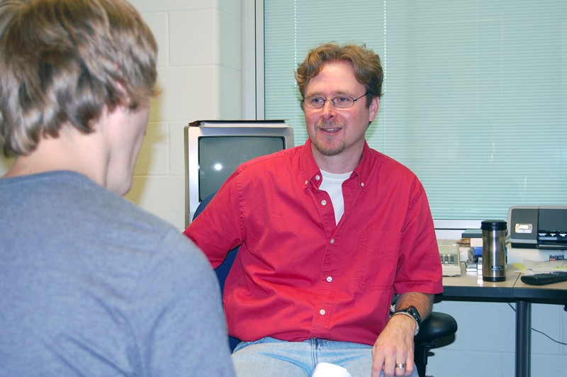 GVL Archive
GVSU film/video professor John Schmit meets with a student