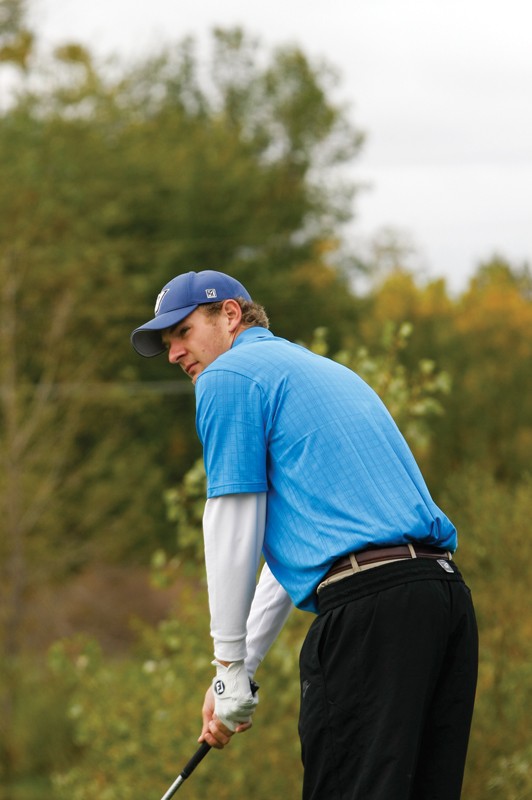 GVL / Archive 
Senior golfer Travis Shooks lining up for a drive. 