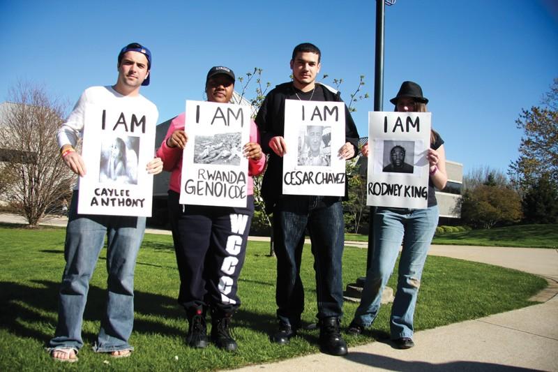 GVL / Robert Mathews
GVSU students (from left to right) Dylan Dunne, Adriana Gibson, Stephen McCreary, Tiffany Kilts protesting for the Rally Against Injustice. 