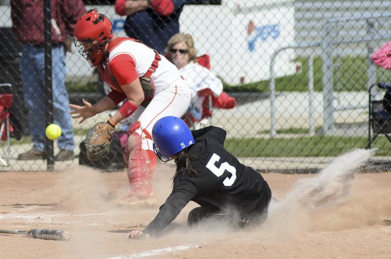 GVL / Bo Anderson

Maggie Kerrigan slides in to score the first run of GVSU's 5-0 win over Saginaw Valley in game two on Saturday.