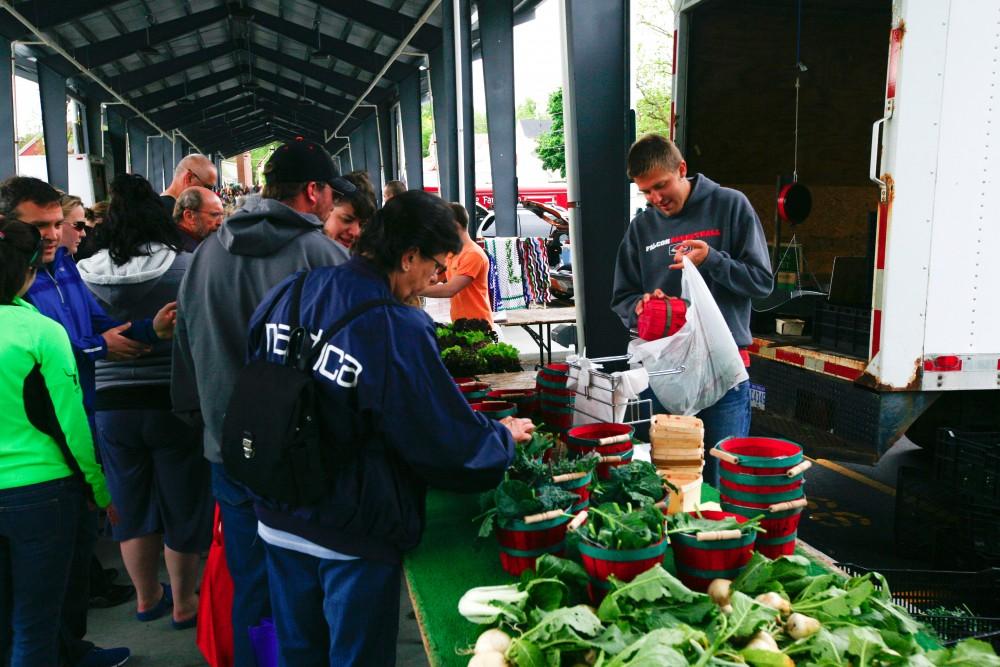 GVL / Eric Coulter
Customers peruse the goods at the Fulton Street Farmers Market on Saturday. 