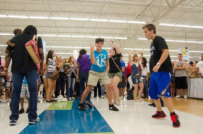 GVL/Bo Anderson Dustin Schonhard leads the pack of dancers during Meijer Mania on Tuesday night.