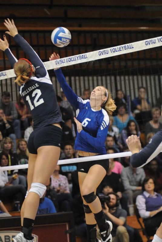 GVL / ArchiveCourtney McCotter spiking the ball during a previous match against Hillsdale College last season. 