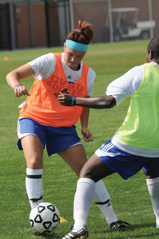 GVL / Eric Coulter
Womens soccer practices before their first match Friday.