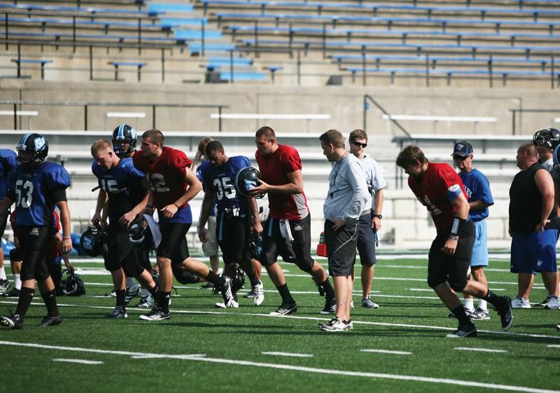 GVL / Robert Mathews
Junior Erik Thompson (11) returning a kick during GVSU's home opener at Lubbers Stadium.