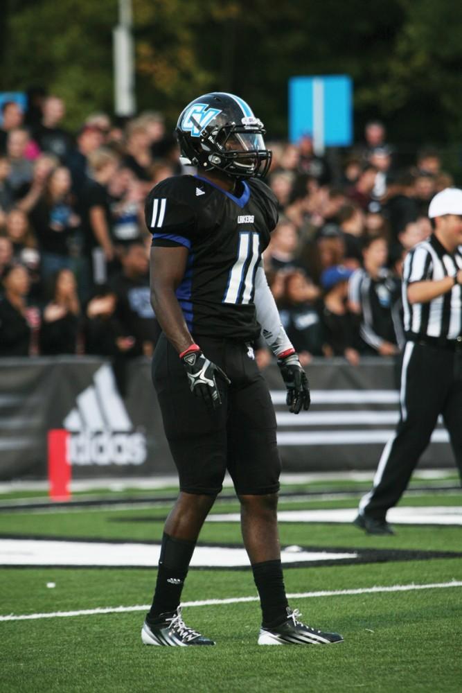 GVL / Robert Mathews 
Junior Erik Thompson (11) preparing to return a kick. 