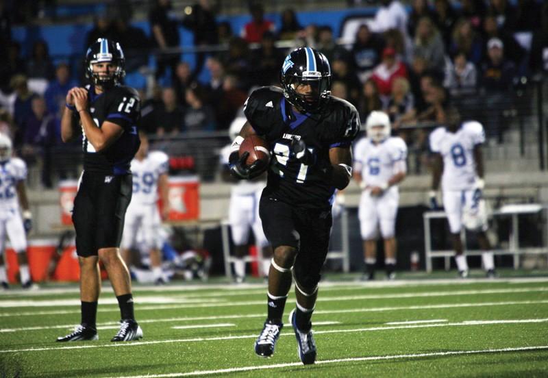 GVL / Robert Mathews 
Freshman Kirk Spencer (27) running the ball against Notre Dame College. 