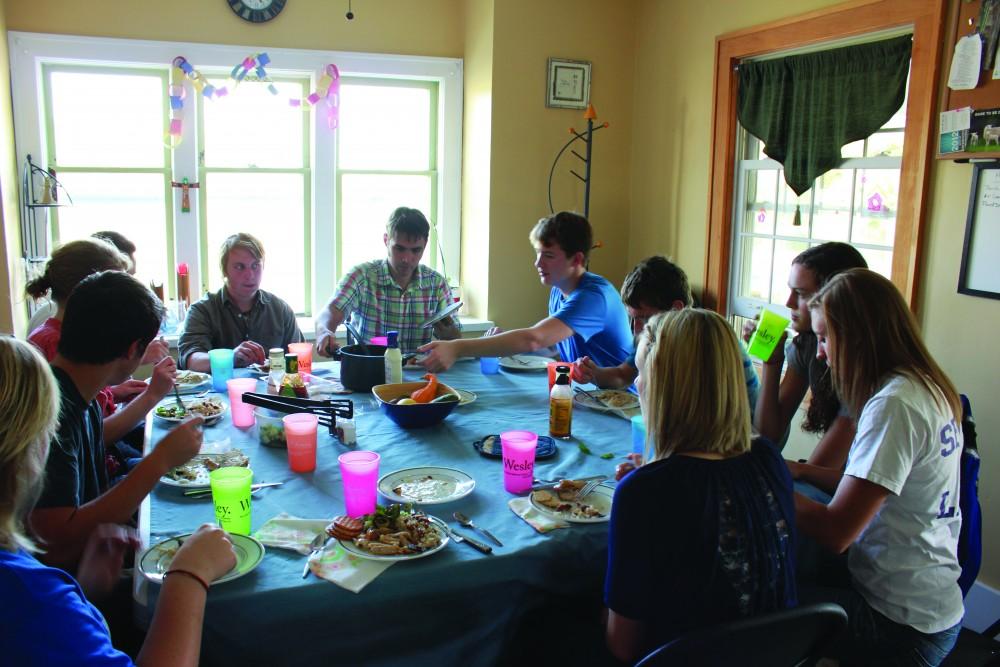 GVL / Kaitlyn Bowman

Students gather for dinner at the Wesley House.