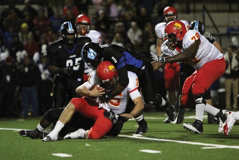 GVL / Robert Mathews
Junior Denzel Rodgers stopping FSU quarterback Jason Vander Laan