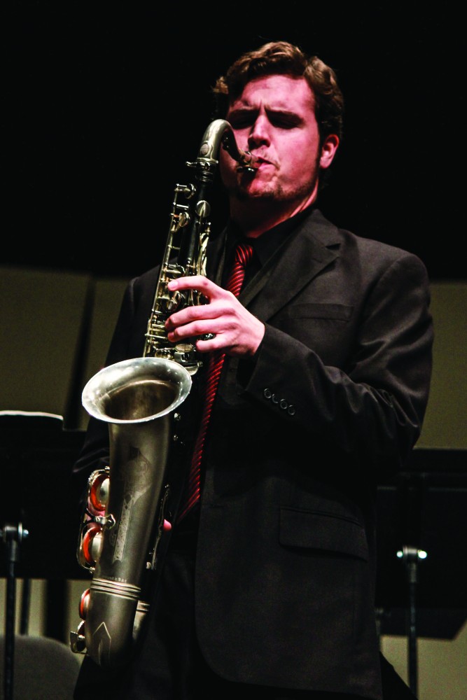 GVL / Kaitlyn Bowman 
GVSU student William G. Scanlon playing the tenor sax. 