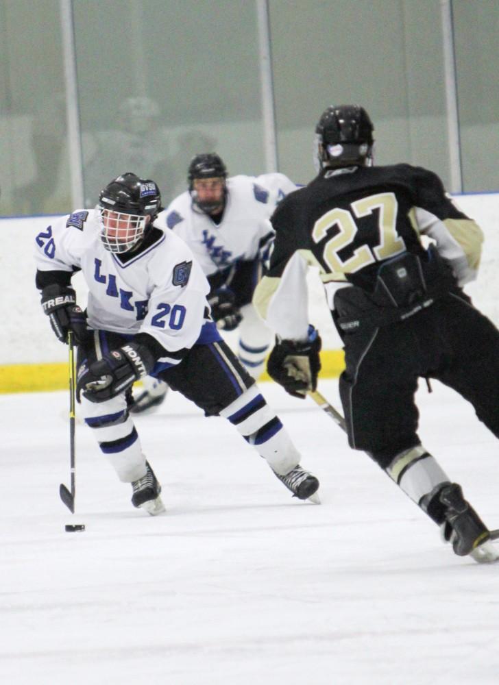 GVL / ArchiveSophomore Matt Smartt (20) moving the puck up the ice during a previous matchup with Oakland University. 