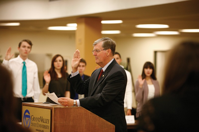 GVL / Eric CoulterPresident Thomas Haas recites an oath for the members of the Student Senate