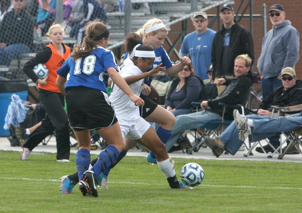 GVL / Eric CoulterMaria Brown fights of two defenders