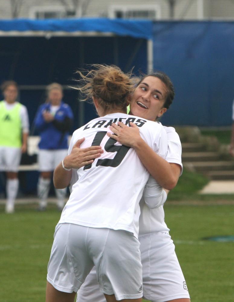 GVL / Eric CoulterAshley Botts hugs Casey McMillan after scoring the third goal of the game