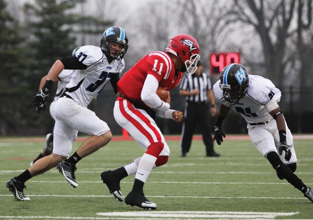 GVL / Robert Mathews
Sophomores Bobby Wunderlich (37) and DeVonte' Jones (21)