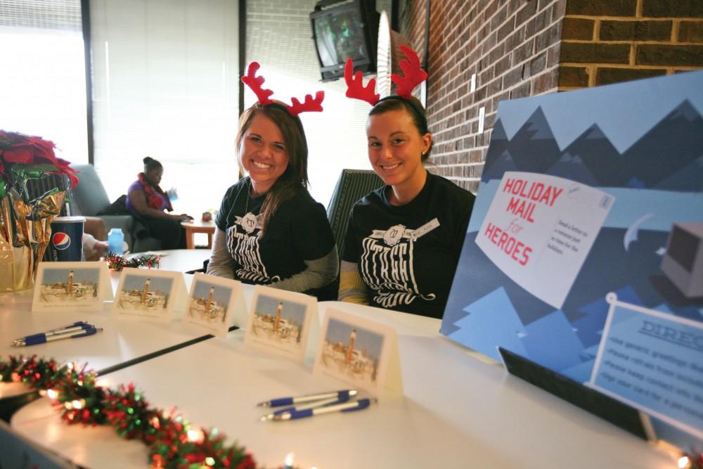 GVL / Robert Matthews

Juniors Jessica Hines (left) and Alica Arnold (right) work with Campus Dining, the GVSU Bookstore, and the American Red Cross as part of the Holiday for Heroes program.