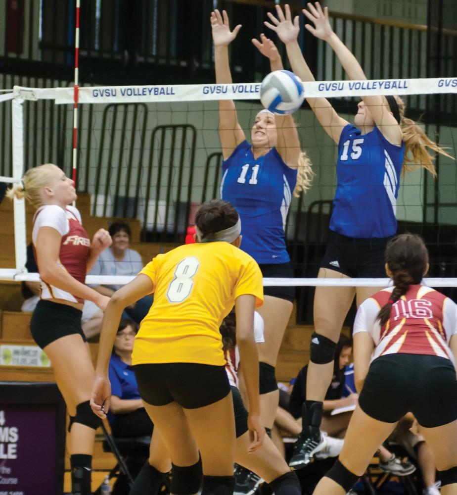 GVL/ArchiveMegan Schroder and Kaleigh Lound rise up for the block.