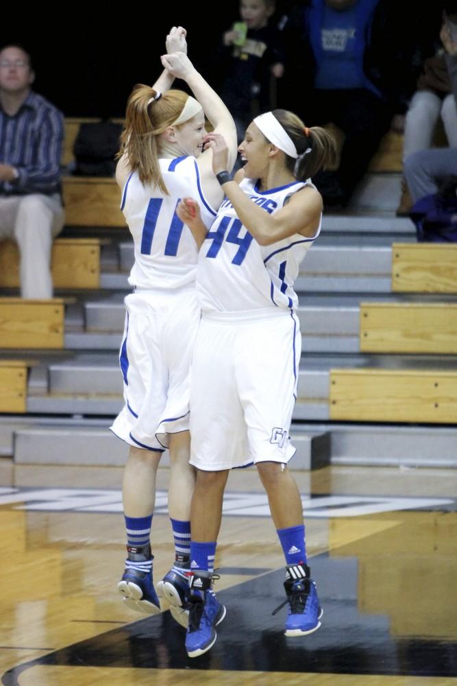 GVL / Jessica Hollenbeck

Breanna Kellogg and Dani Crandall pump up before their game on Monday Night against Olivet.