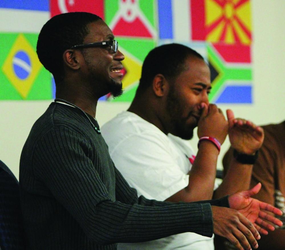 GVL / Jessica Hollenbeck Students Dmitri Westbrook (left) and Jamar Ragland (right) from the Act on Racism group performs a skit during Monday nights event We are One.
