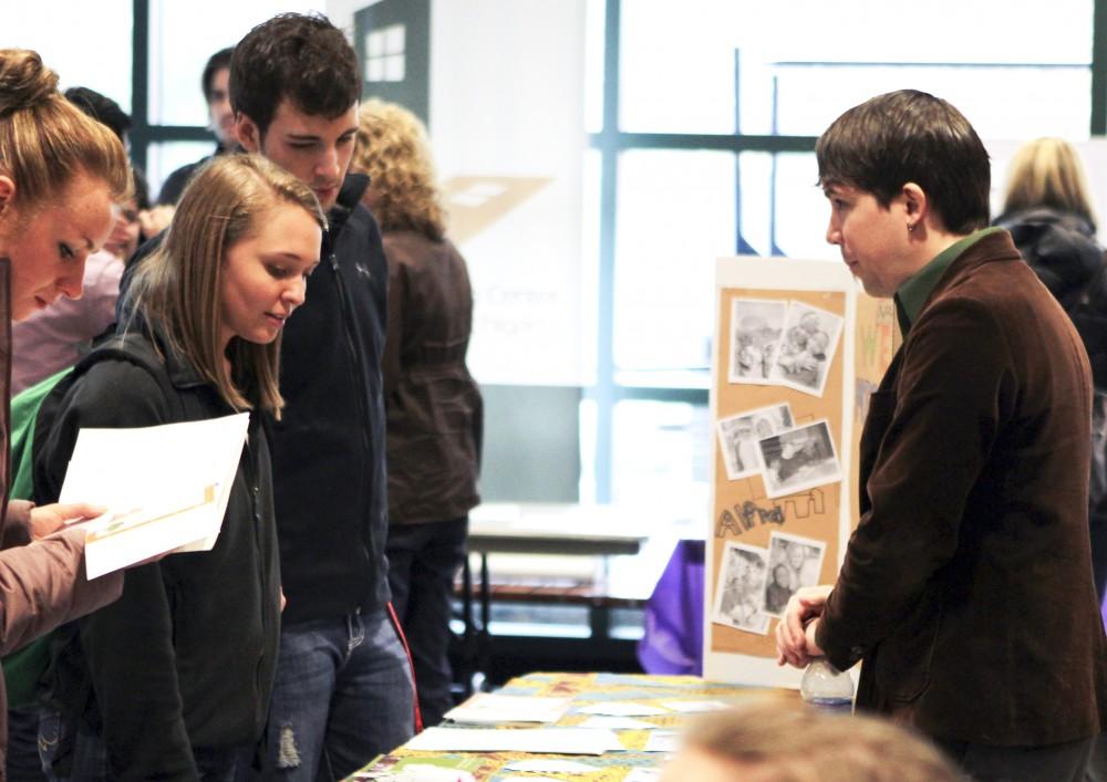 GVL / Robert Mathews 
Students visit booths for the Non-Profit Volunteer and Internship Fair in Henry Hall last January.